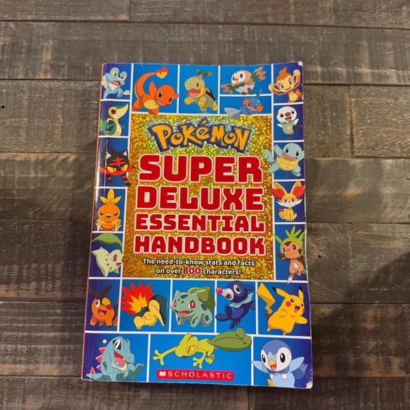 Super Deluxe Essential Handbook Pokémon Stats and Facts on Over 800 Characters - Picture 1 of 11